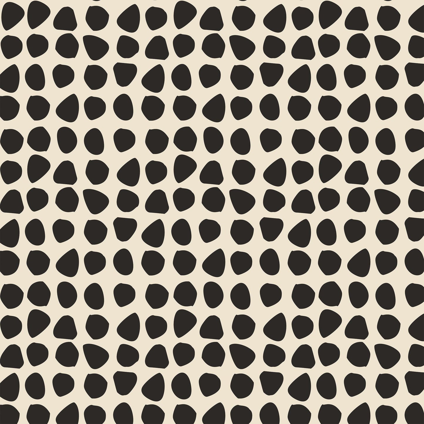 Closeup view of Organic Dots Wallpaper in Cream by artist Brenda Bird