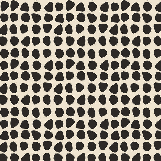 Closeup view of Organic Dots Wallpaper in Cream by artist Brenda Bird
