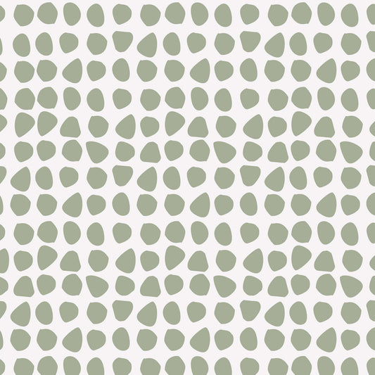 Close up view featuring Ayara's Organic Dots in Sage Green peel and stick, removable wallpaper designed by artist Brenda Bird