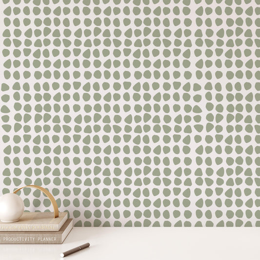 Office wall featuring Ayara's Organic Dots in Sage Green peel and stick, removable wallpaper designed by artist Brenda Bird