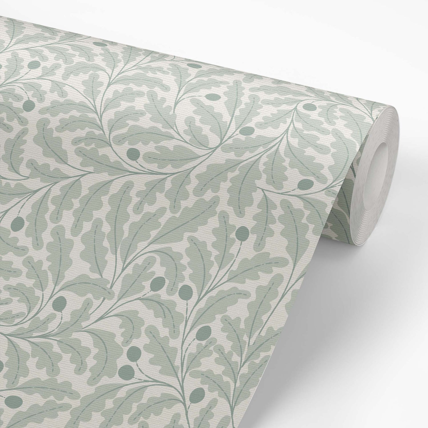 Roll of wallpaper with a leaf pattern in blue green
