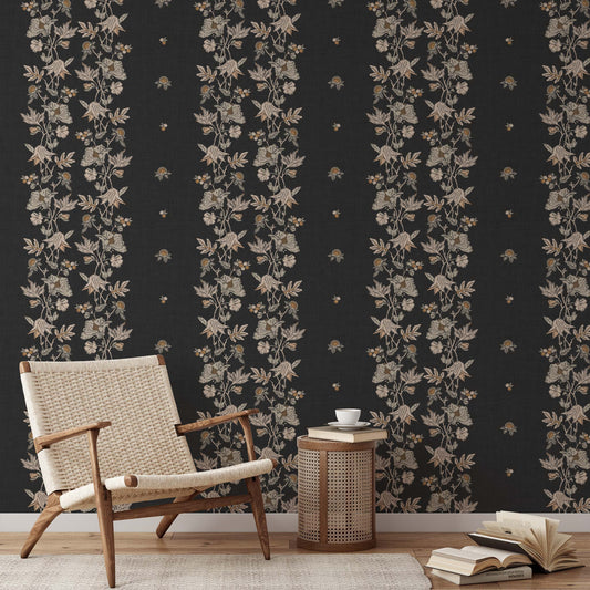 Coral Vines Wallpaper in Ash shown in a living room.