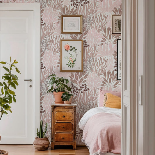 Coral Garden Wallpaper in Coral shown in a bedroom