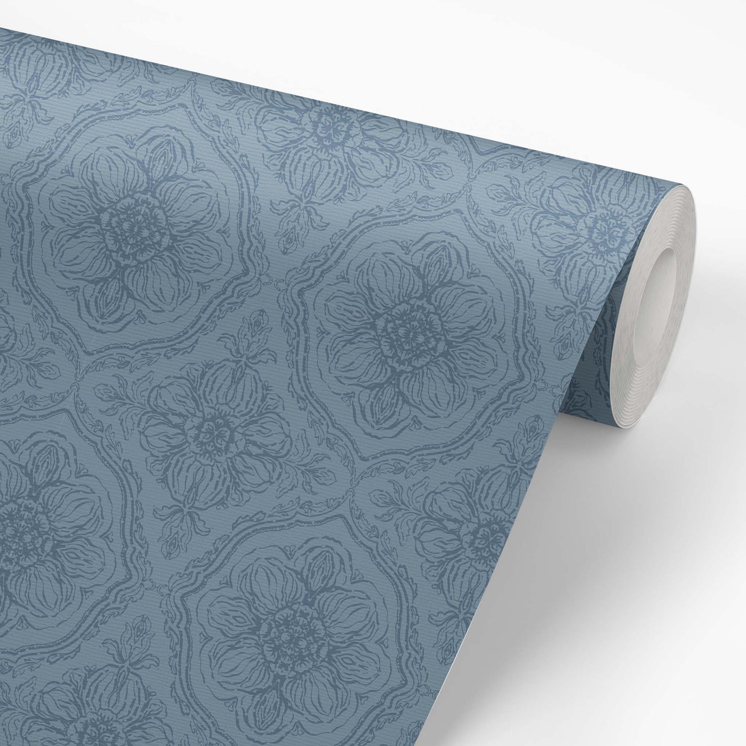 Roll of blue floral patterned wallpaper