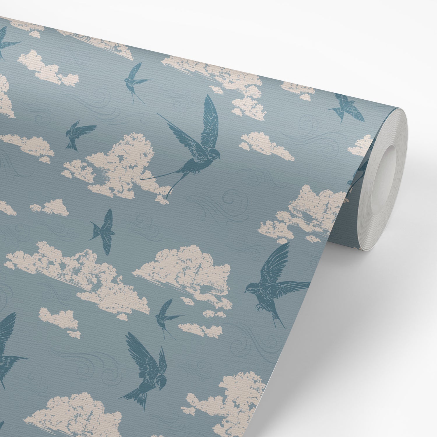 Dancing Swallows Wallpaper in Dusty Blue shown on a wallpaper roll.