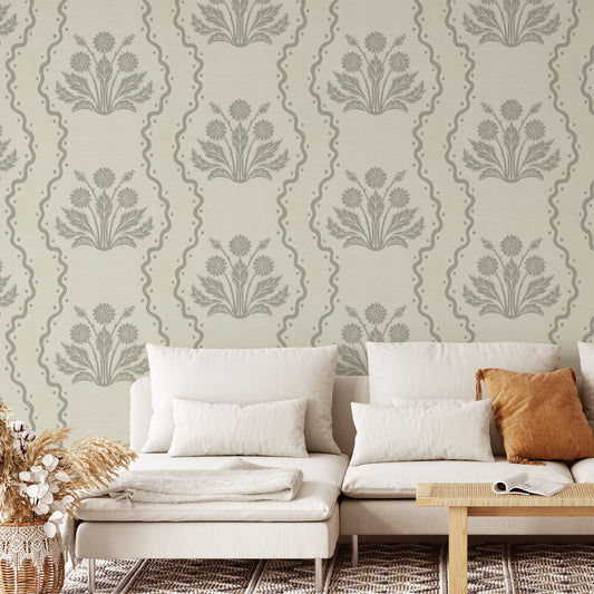 Dandelion Block Printed Wallpaper in Dry Sage shown in a living room.