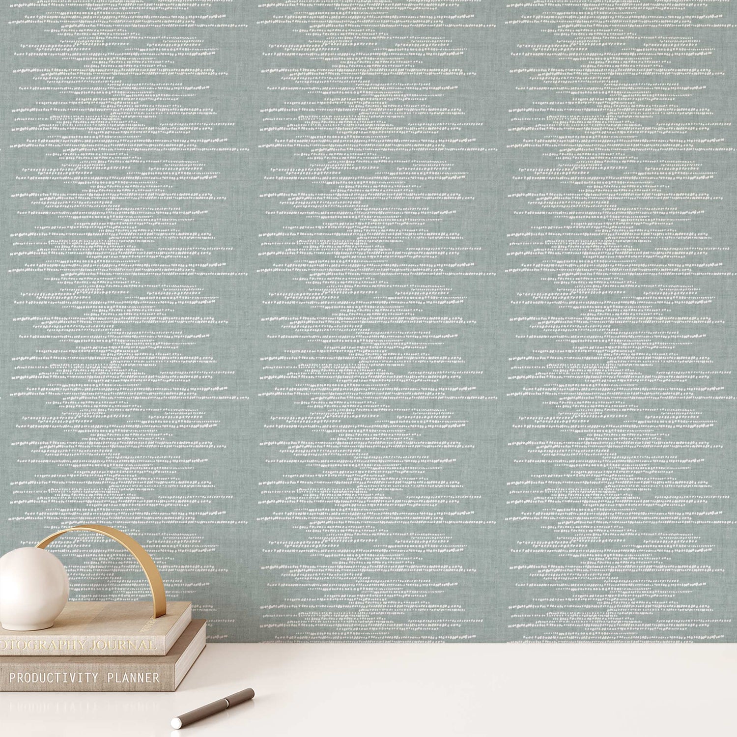 Dotted Lines Wallpaper in Soft Teal shown on an office wall