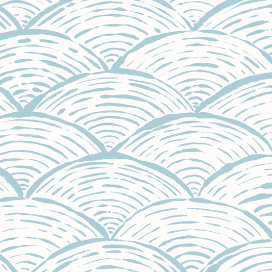 Scallops Wallpaper in Blue shown in a close up view.
