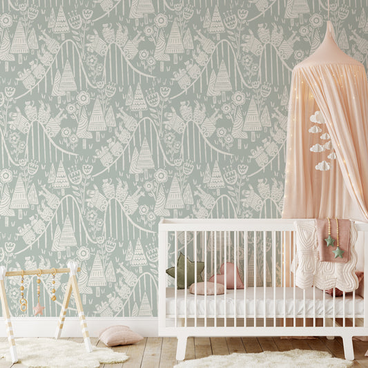 In the Theme Park Wallpaper in Sea Green shown in a nursery.