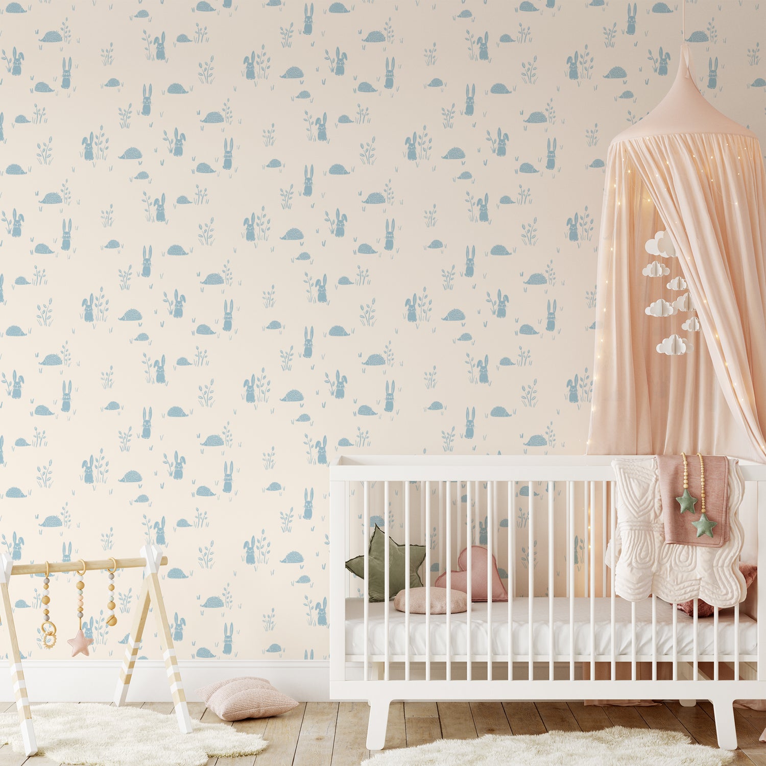 Hedgehogs and Rabbits Wallpaper in Blue shown in a nursery. 