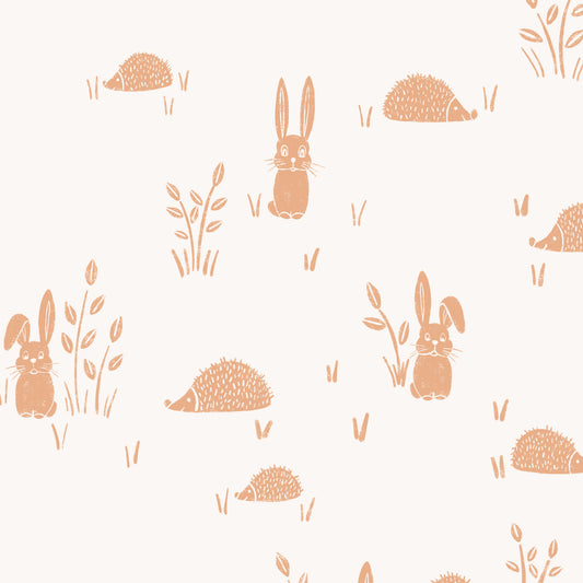 Hedgehogs and Rabbits Wallpaper in Apricot shown in a close up view.