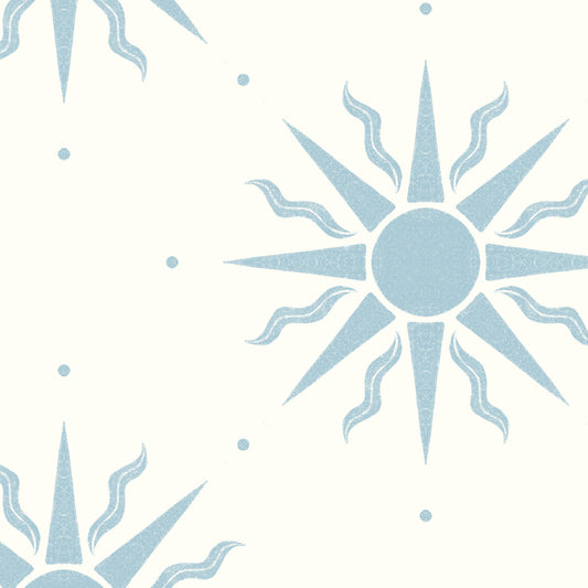 Sunny Suns Wallpaper in Blue shown in a close up view.
