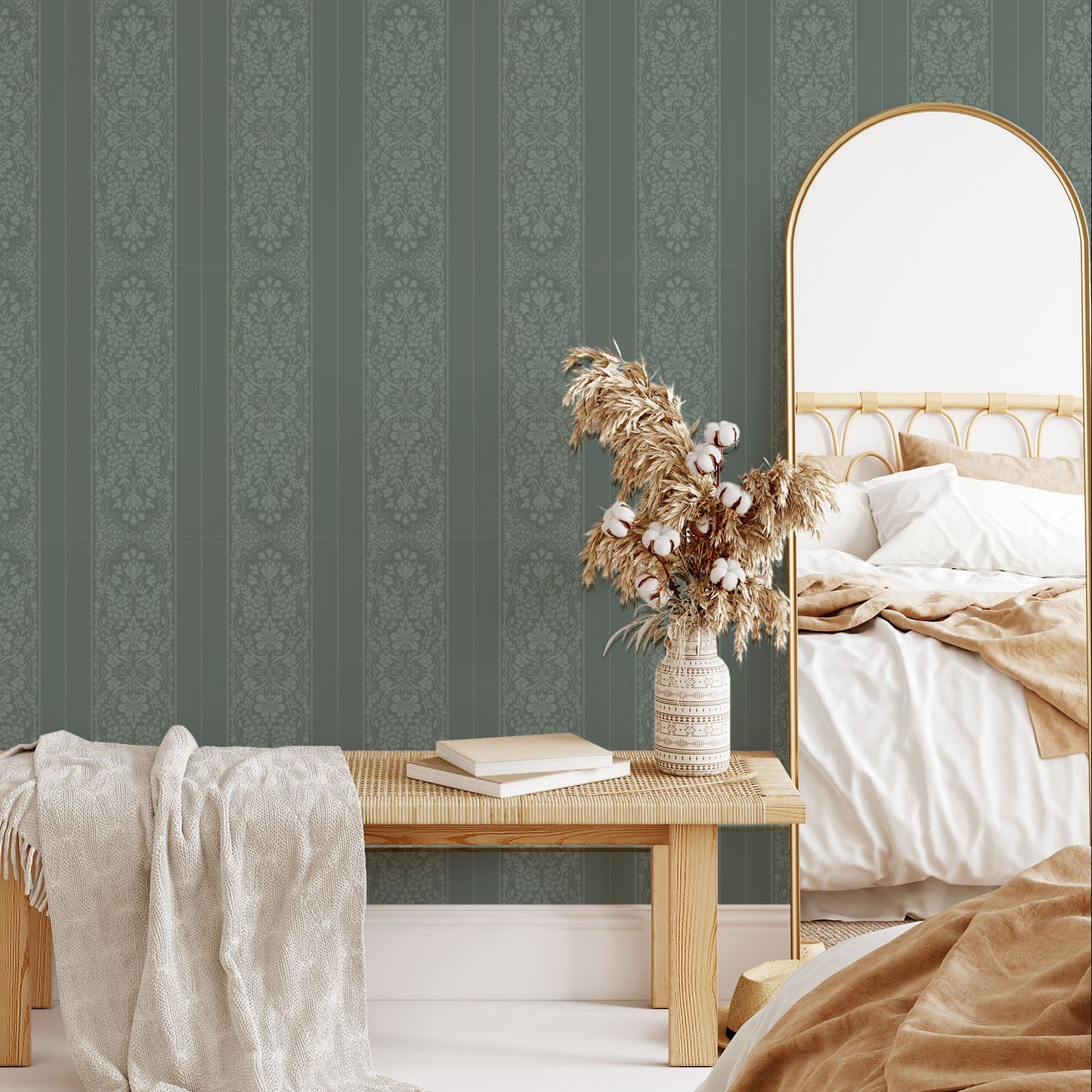 Bedroom with green striped wallpaper, wooden bench, and bed.