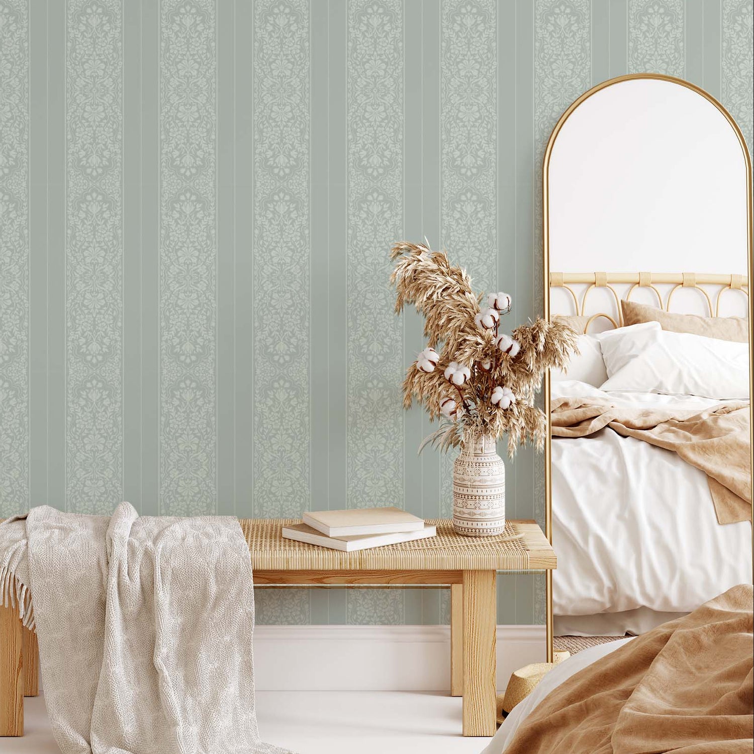 Bedroom with striped wallpaper, wooden bench, and mirror.