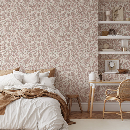 Bedroom with floral wallpaper, bed, desk, and chair.