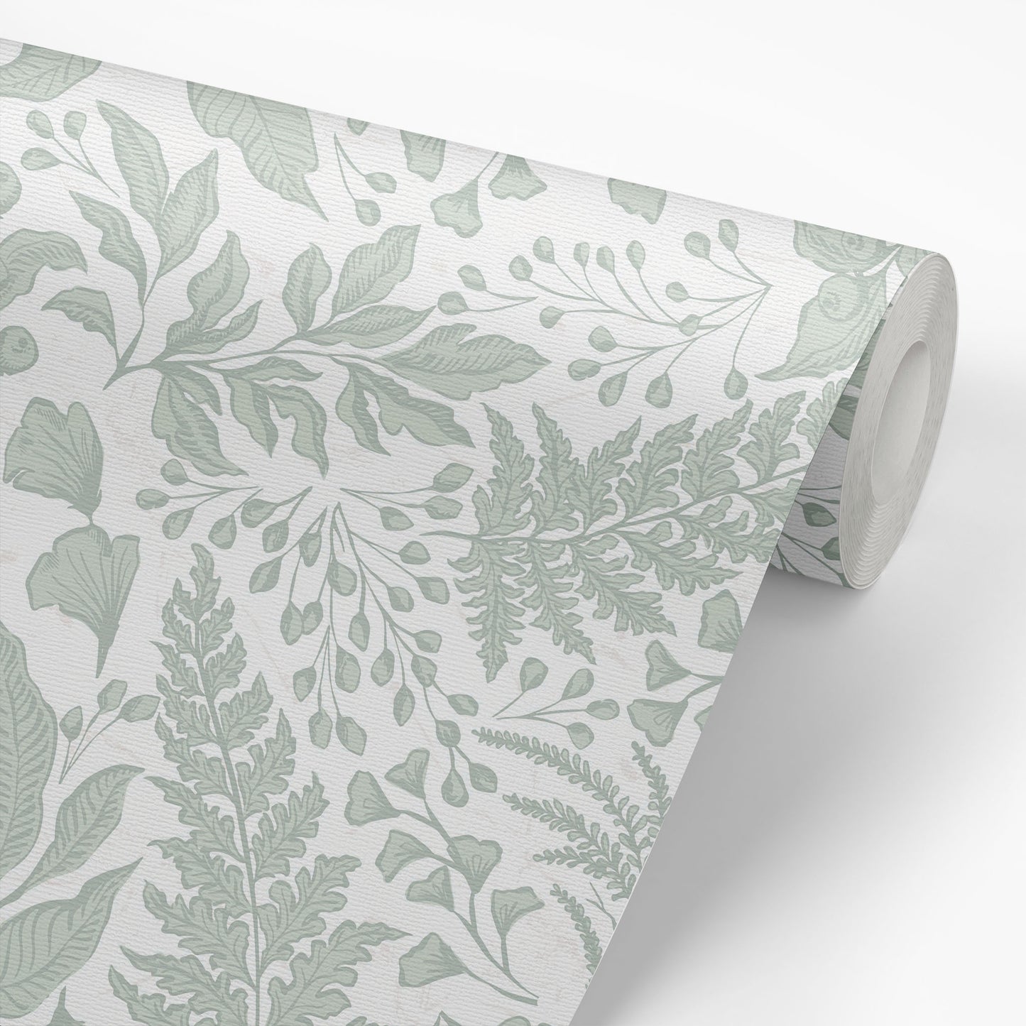Roll of wallpaper with green leaf pattern on a white background