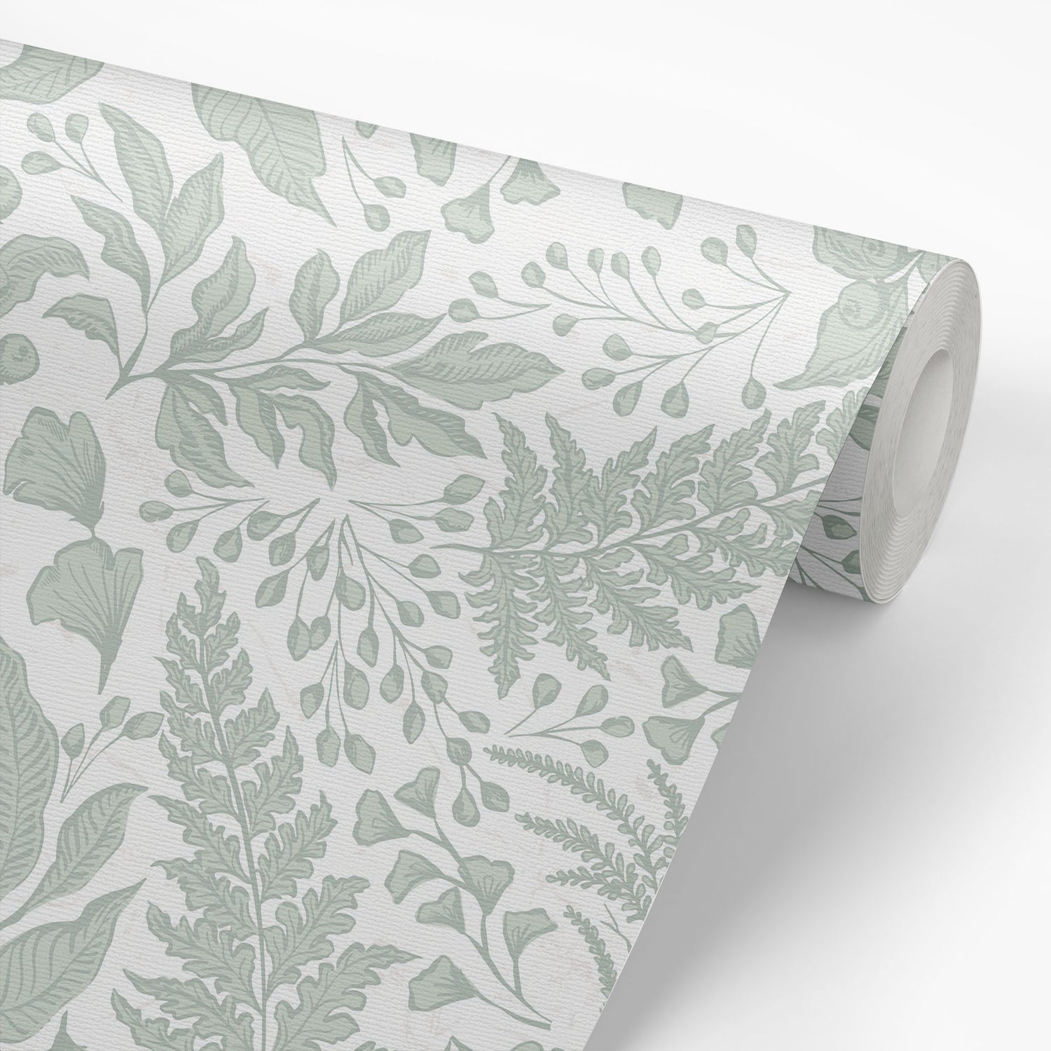 Roll of wallpaper with green leaf pattern on a white background