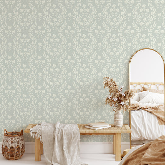 Indulge in the delicate beauty of our Renaissance Revival Wallpaper. Its soft mint tones and intricate floral design exude elegance and sophistication, adding a touch of luxury to any room.
