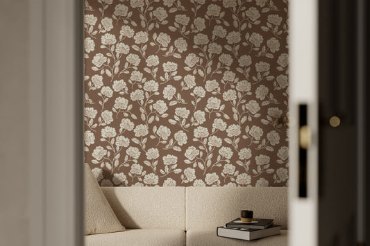 Heirloom Blooms Wallpaper in Brown shown in a living room.