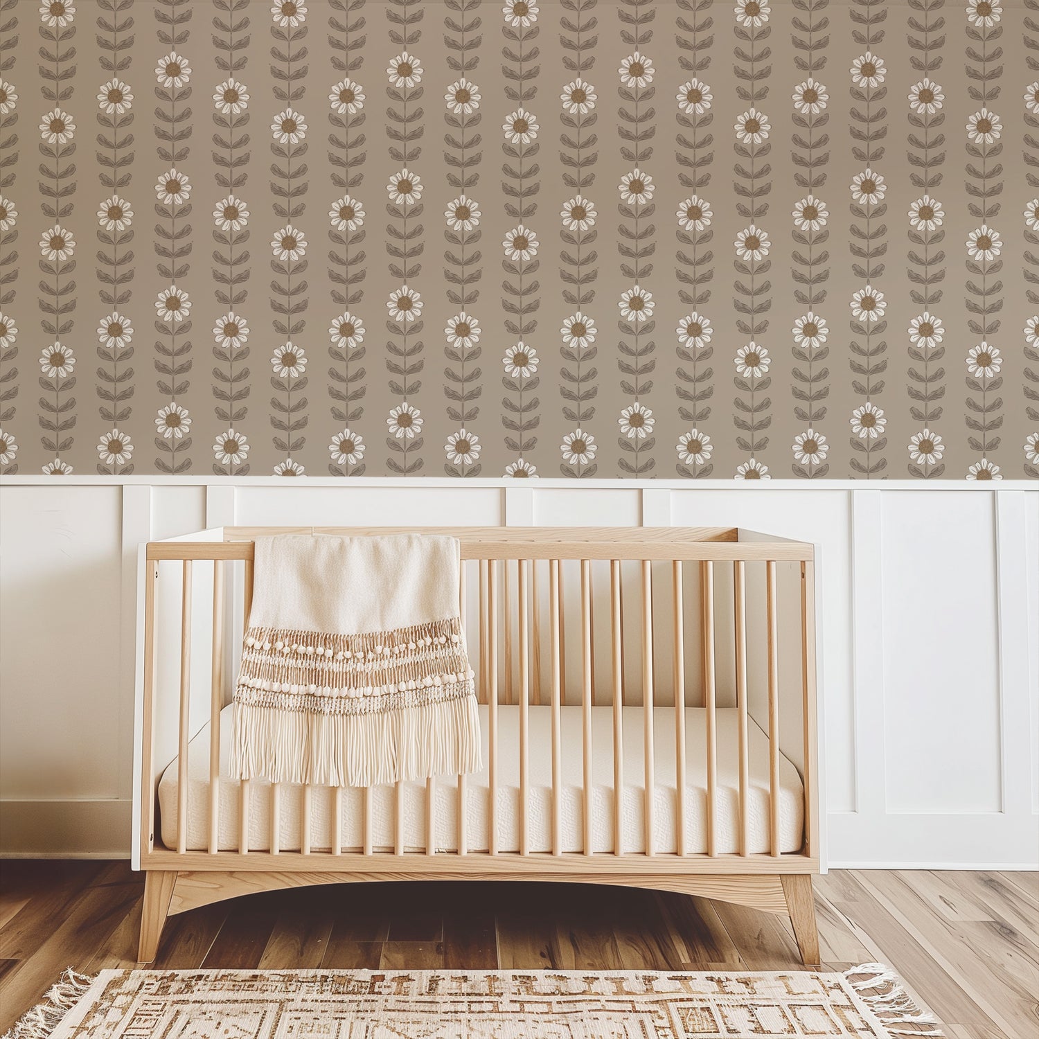 Daisy Meadow Wallpaper in Mocha shown in a nursery.