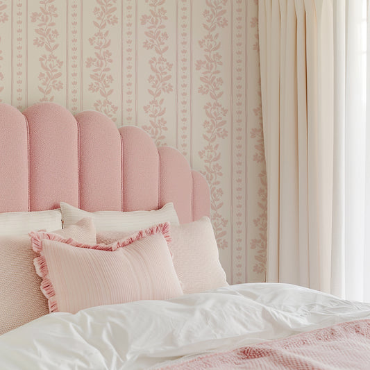 Striped Tulips Symphony Wallpaper in Pink shown in a bedroom.