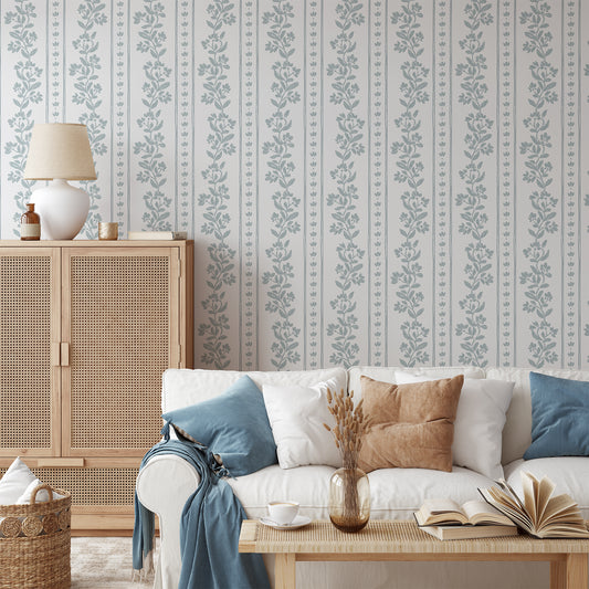 Striped Tulips Symphony Wallpaper in Sky Blue shown in a living room.
