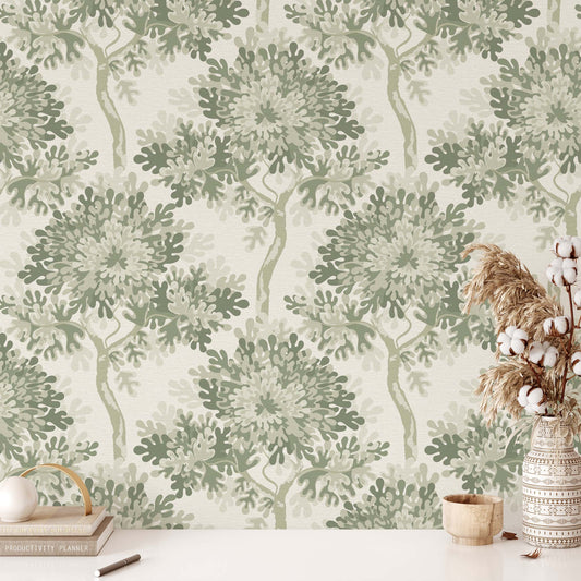 Wallpaper with green leaf pattern in a room with decor items.