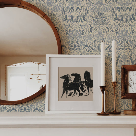 Heritage Spring Wallpaper in Cream and Blue shown on a fireplace.