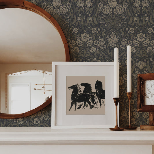 Heritage Spring Wallpaper in Dark Gray shown on a fireplace.