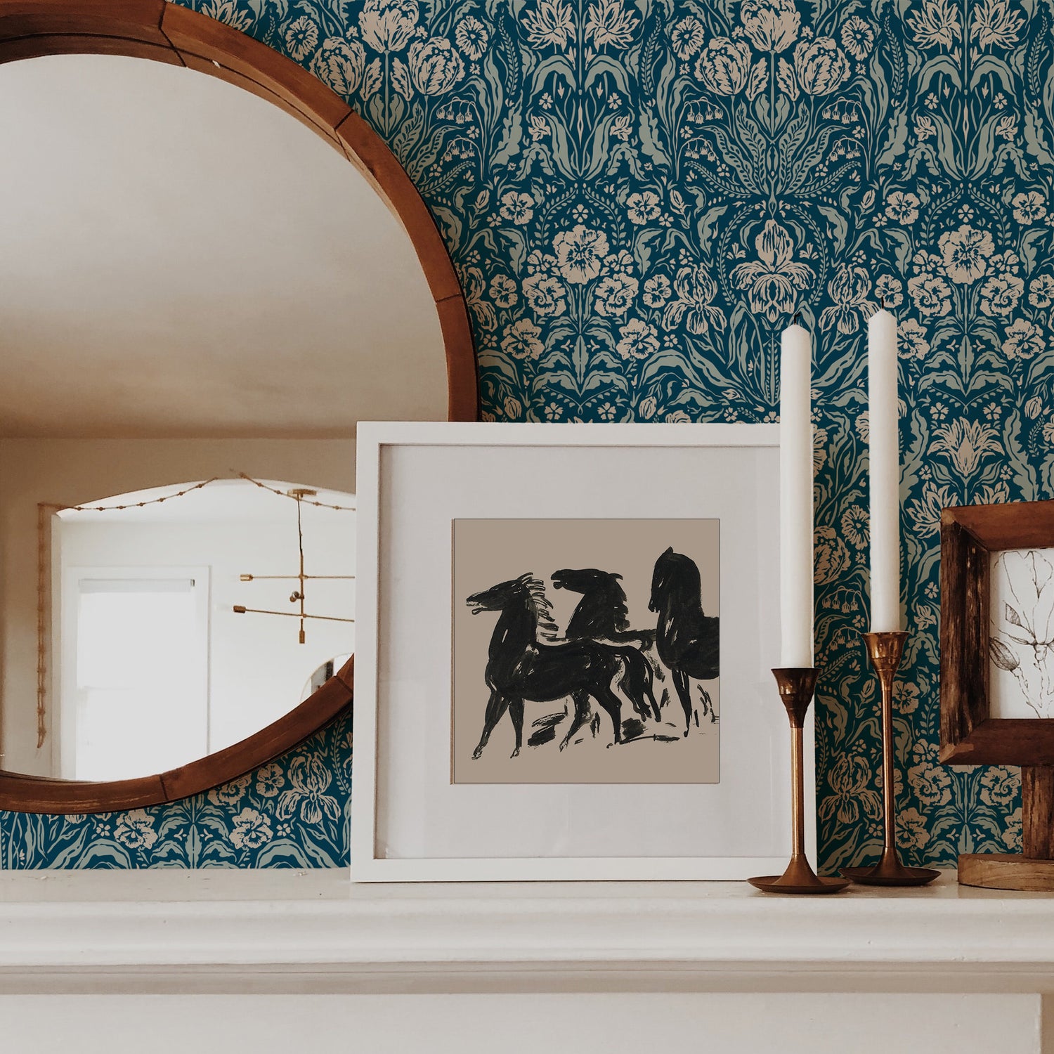 Heritage Spring Wallpaper in Teal and Navy shown on a fireplace.