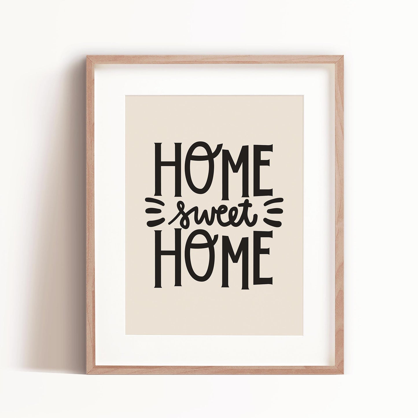Home Sweet Home art print in black in a frame by artist Brenda Bird.
