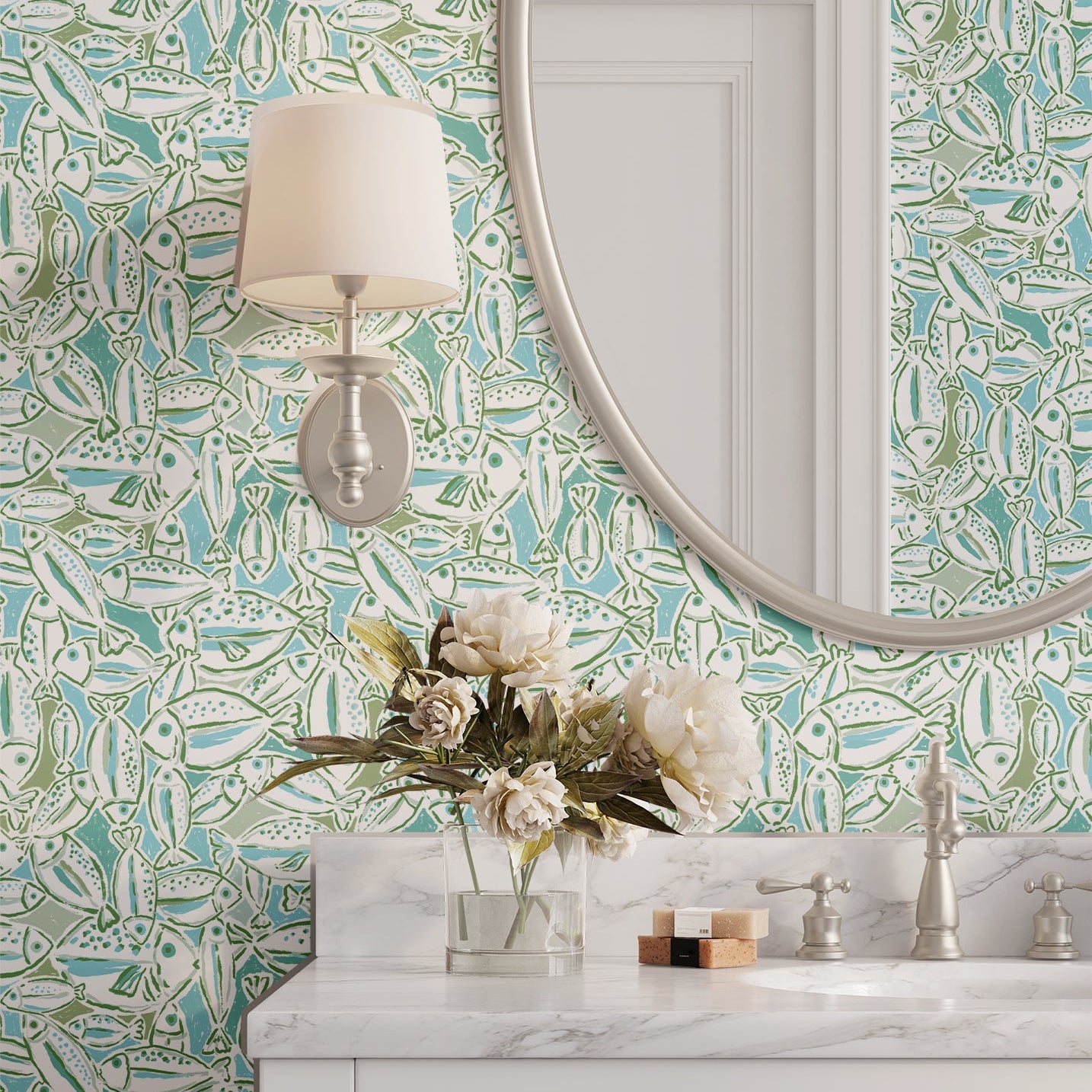 Bathroom with wallpaper with a fish pattern in green