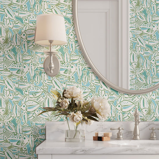 Bathroom with wallpaper with a fish pattern in green