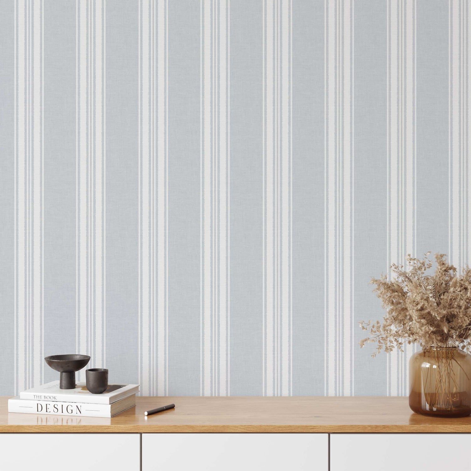 Linen Stripes Wallpaper in French Blue Gray shown on a statement wall