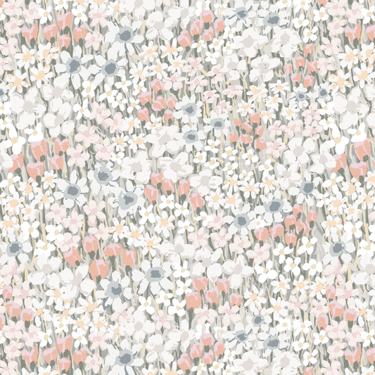 Floral pattern with small flowers in muted colors on a light background