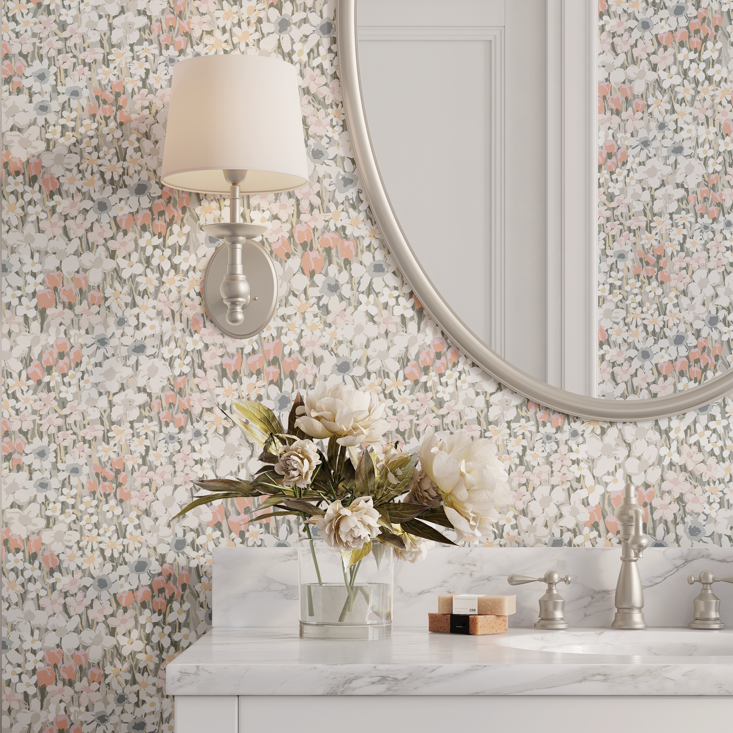 Bathroom with floral wallpaper, round mirror, and marble countertop.
