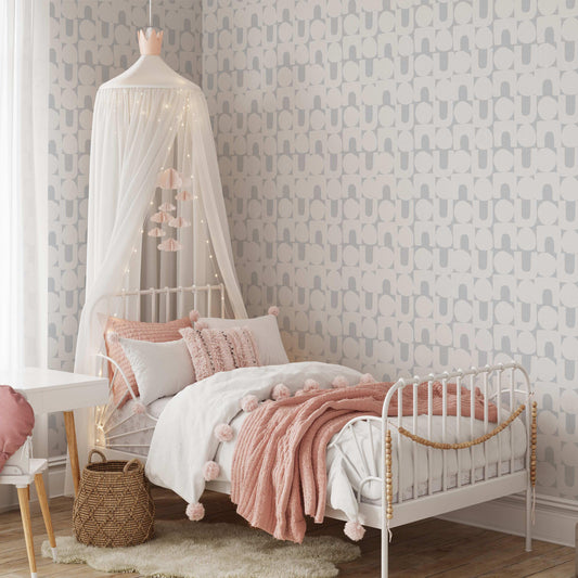 Modern Spheres and Arches Wallpaper in French Blue Gray shown in a girls bedroom
