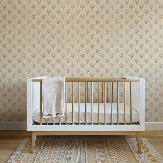 Foraged Peonies Wallpaper in Sand shown in a nursery