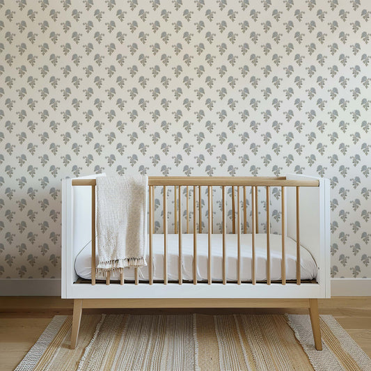 Foraged Peonies Wallpaper in White shown in a nursery