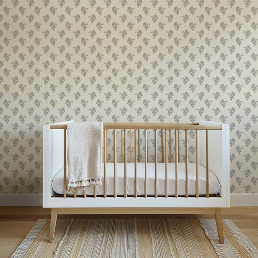 Foraged Peonies Wallpaper in Cream shown in a nursery