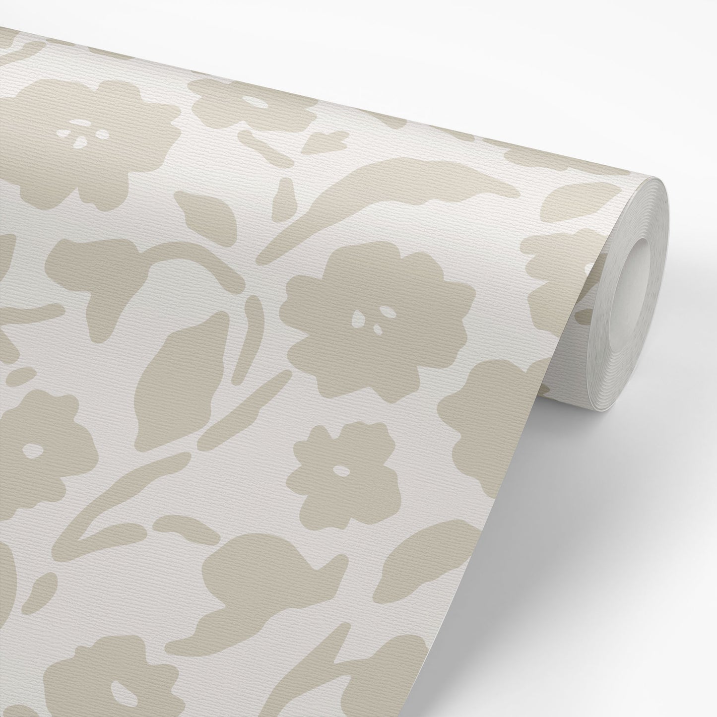Add a touch of femininity to your space with our Lexington Wallpaper in a taupe hue shown on a wallpaper roll.