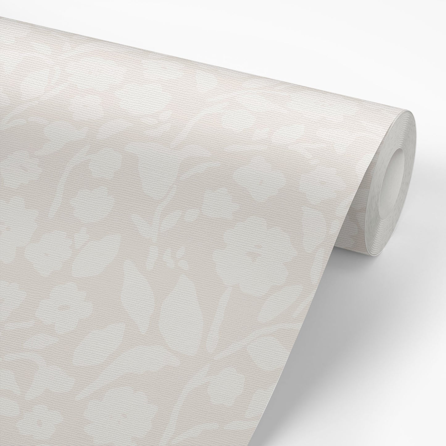Add a touch of femininity to your space with our Lexington Wallpaper in a cream hue shown on a wallpaper roll.