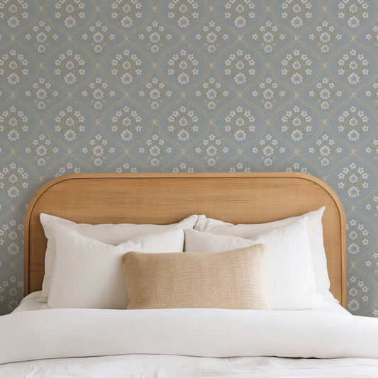 Romantic Trellis Wallpaper in French Blue shown in a bedroom