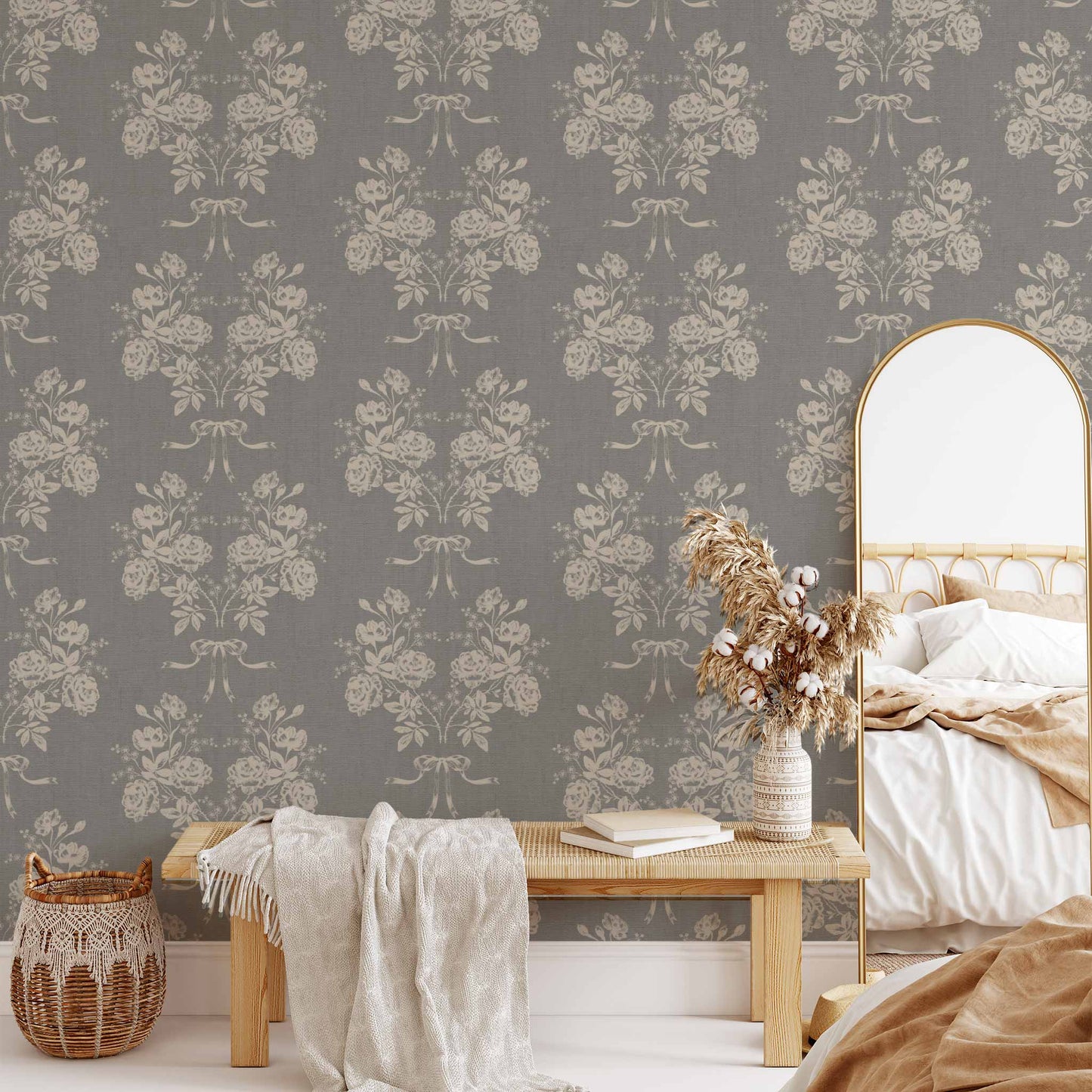 Roses and Ribbons Wallpaper in Ash shown in a living room.