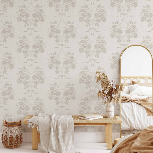 Roses and Ribbons Wallpaper in Off White shown in a living room.