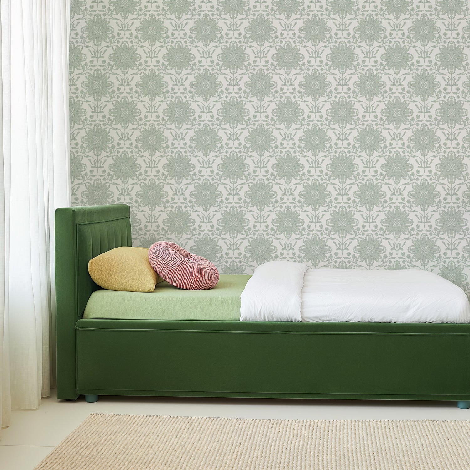 Rosette Wallpaper in Sage shown in a kids bedroom.