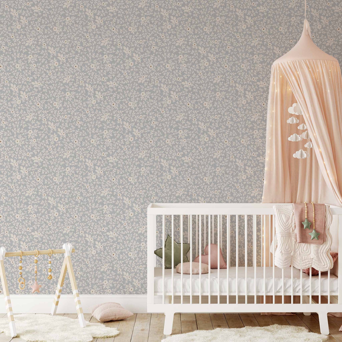 Elegant Florals Wallpaper in French Blue shown in a nursery.