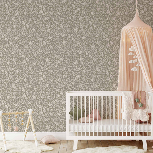 Elegant Florals Wallpaper in Sage shown in a nursery.