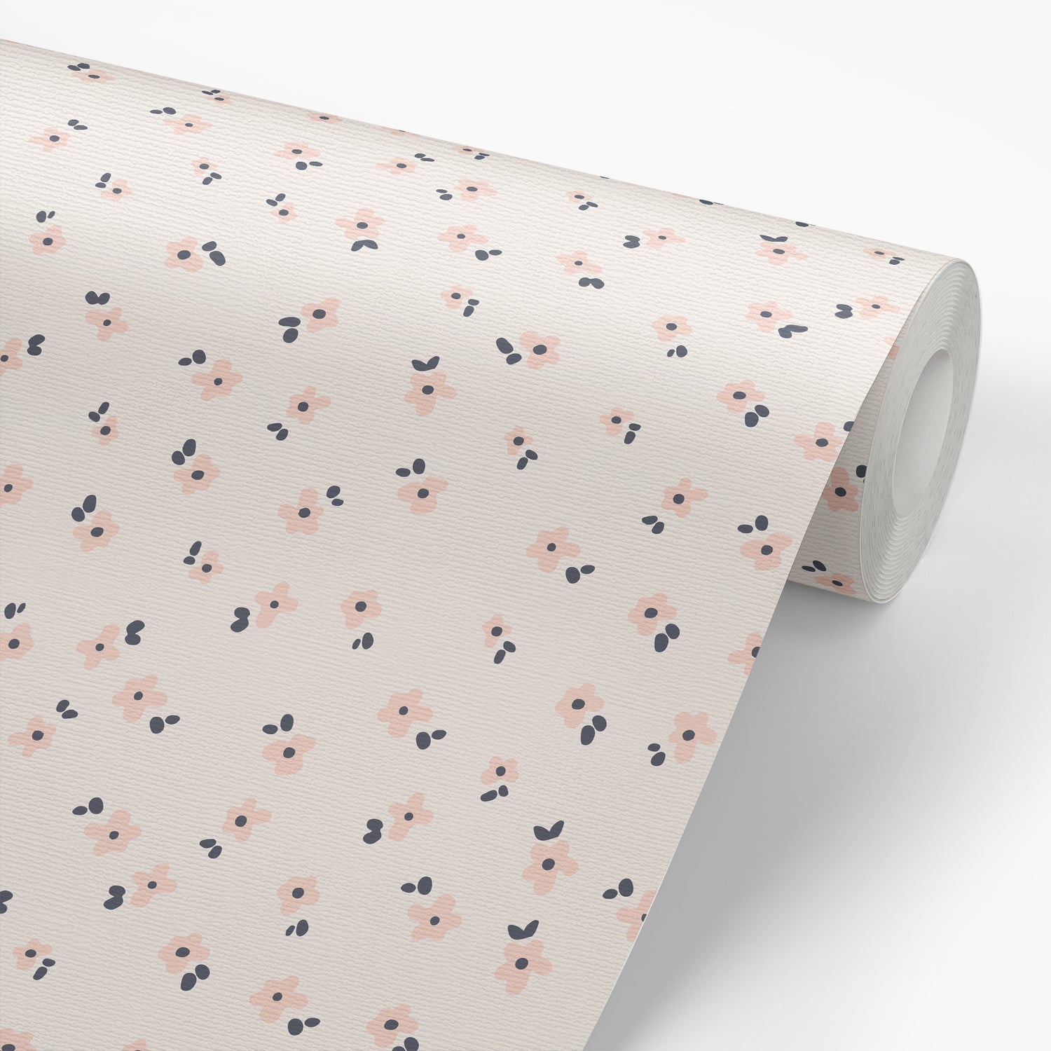 Our Snow in Summer removable peel and stick wallpaper in Blush shown on a roll of wallpaper.