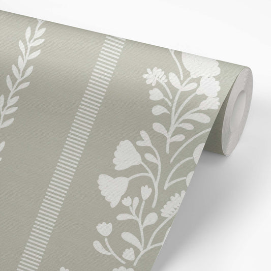 Sweet Floral Stripe Wallpaper in Sage on a roll of wallpaper